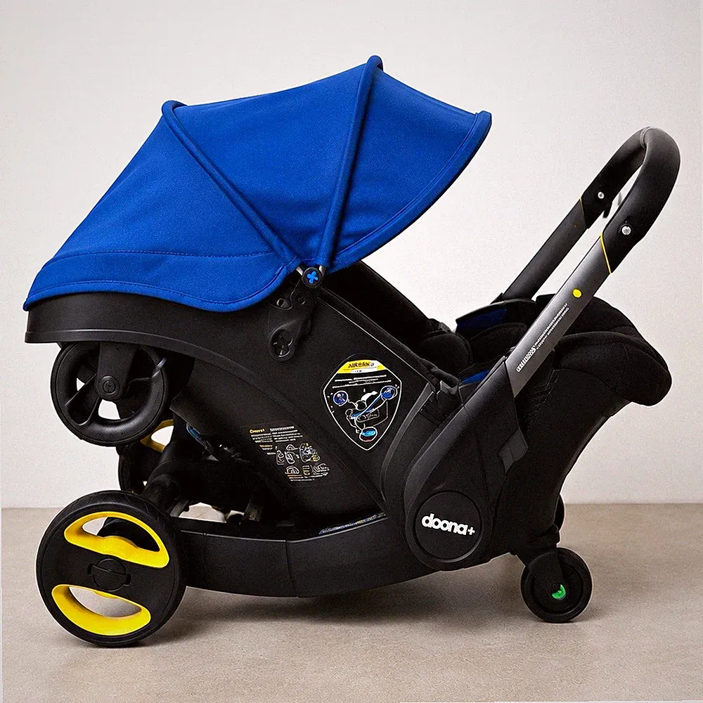 Doona Doona+ Kinderwagen/Autositz blau/schwarz klappbar Einsitzer
