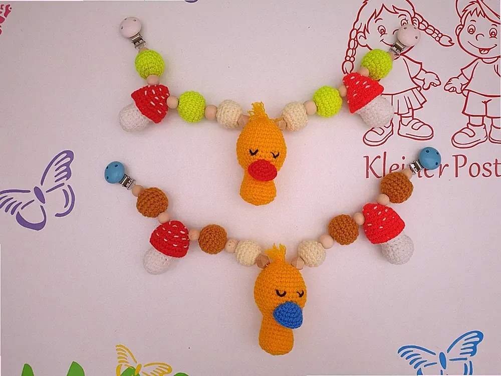Kinderwagenkette Babyschalenkette Spielmattenkette Ente Hund gehäkelt