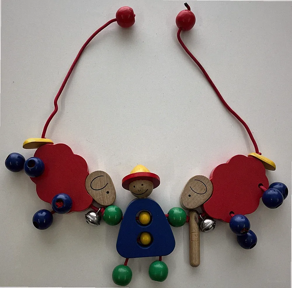 Kinderwagenkette Holz Schaf Spielzeug Motorik Motorikspielzeug rot blau