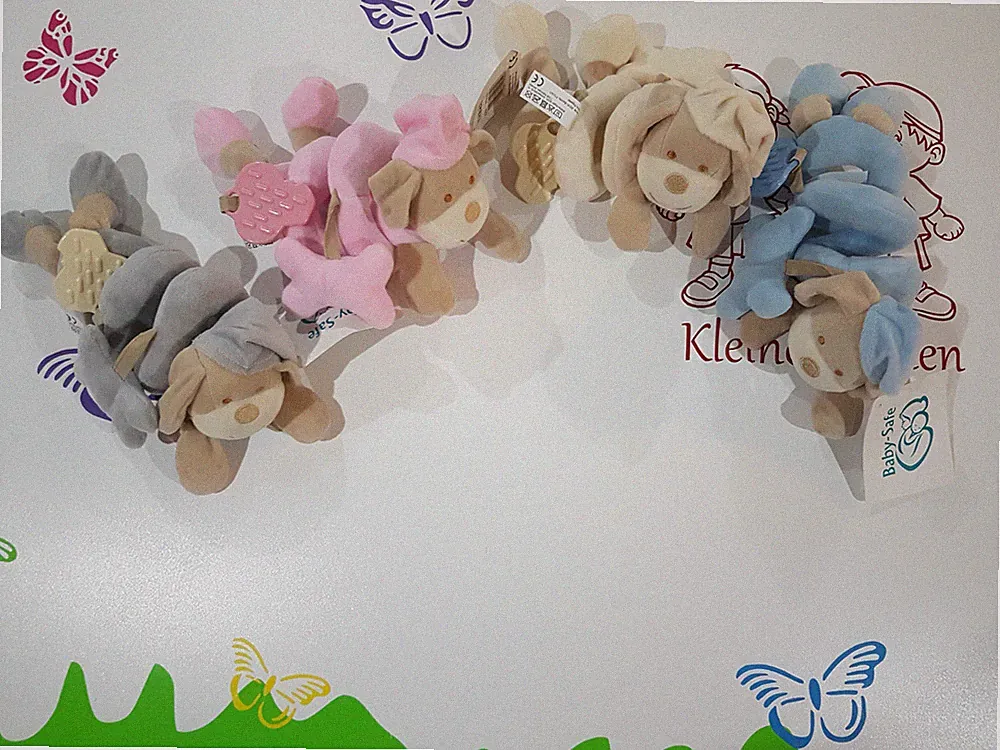 Kinderwagenkette Spirale Rassel Plüschtier Greifspirale Ente Hund