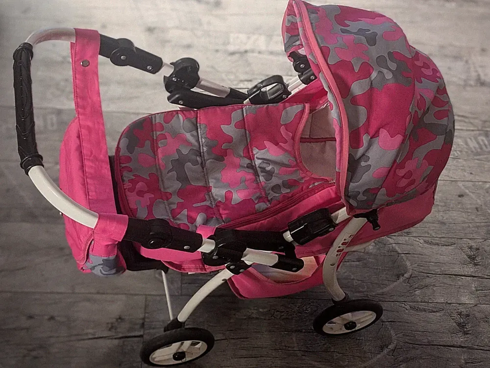Puppenwagen, einfach wandelbar zum Jogger/Buggy, inklusive Pflegetasche,in pink