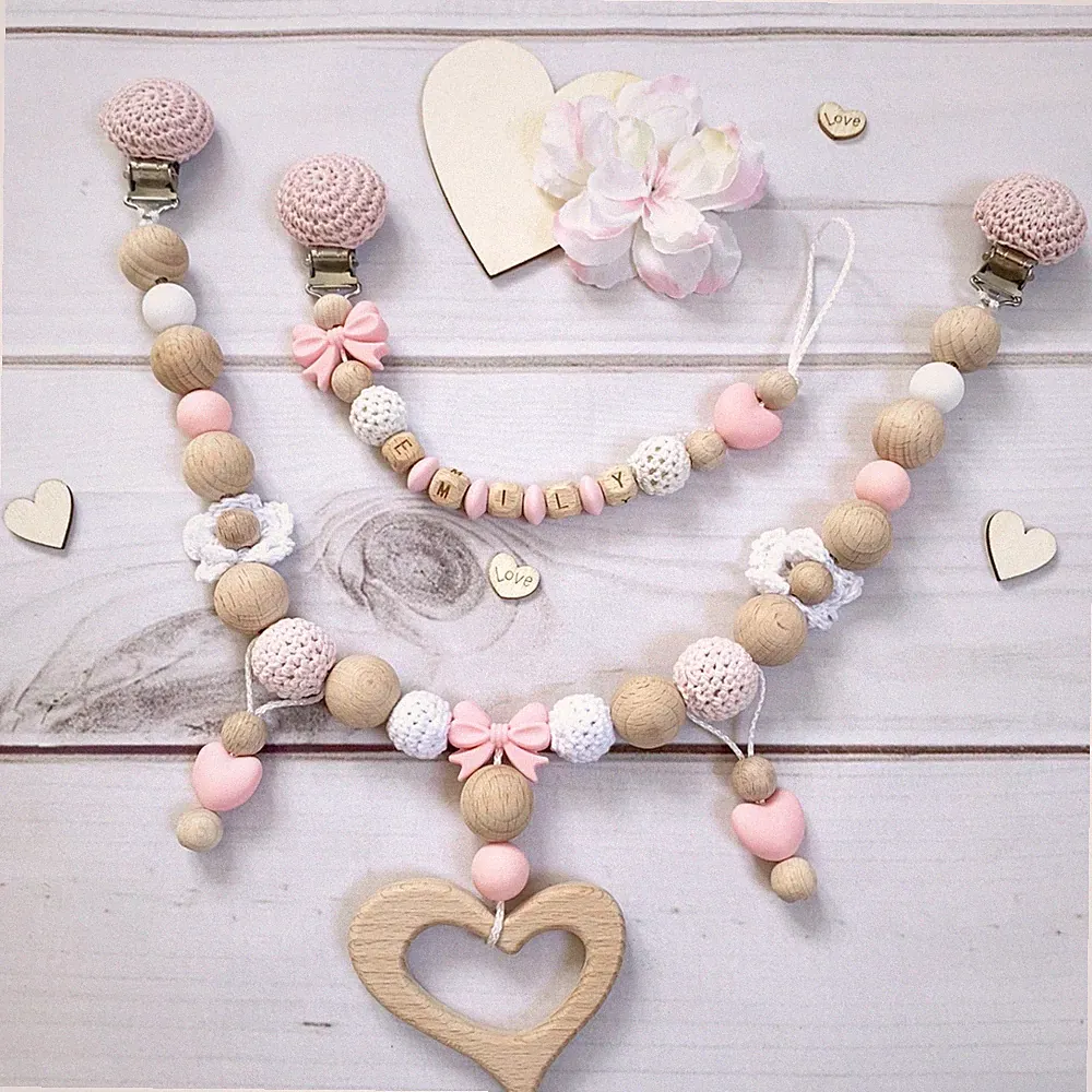 Schnullerkette Kinderwagenkette Nuckelkette mit Namen rosa weiß Holz Silikon